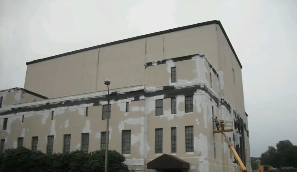 Multi-story commercial building exterior painting in Tacoma